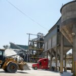 Repeating blue and white angular shapes forming a modern abstract geometric pattern