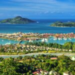 Modern abstract graphic featuring a colorful gradient mesh background with sharp geometric shapes and accents