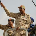 Minimalist blue and white geometric design with overlapping angular shapes