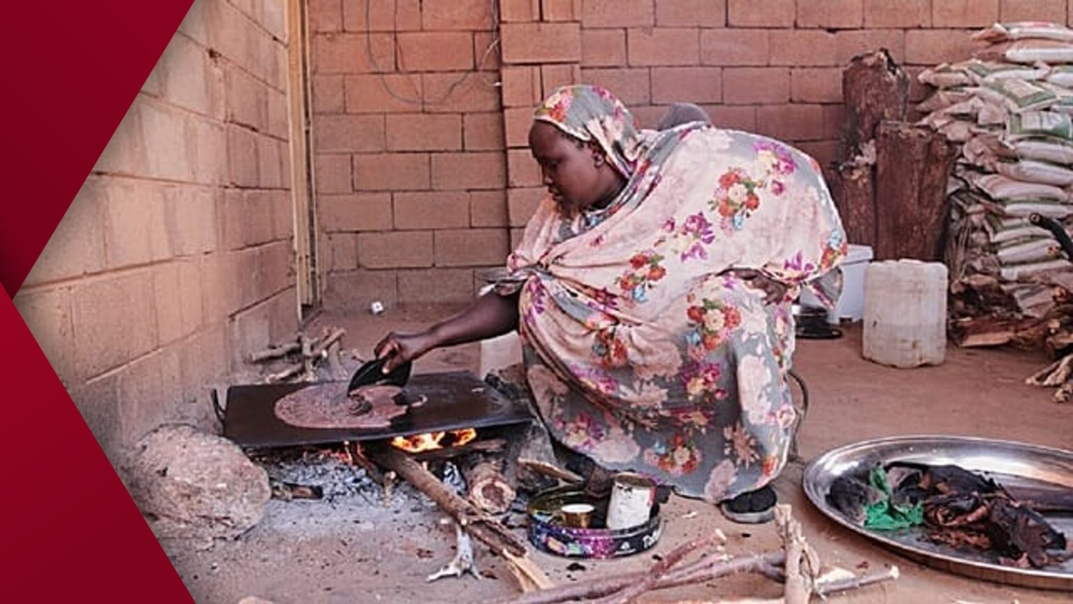 Contemporary glass-paneled office tower reflecting sky and clouds
