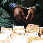 Abstract neon geometric gradient mesh background with vibrant pink, purple and blue tones forming a modern digital pattern