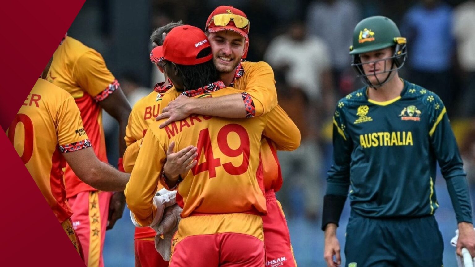 Australian left-arm paceman Mitchell Starc mid-delivery stride, eyes locked on the stumps, Zimbabwe opener at the non-striker’s end, night-match floodlights blazing at the ICC Men’s T20 World Cup 2026