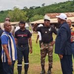 Close-up of juicy red strawberries stacked in a rustic wooden crate, shot on 5 February 2026