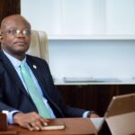 Vibrant daytime street market scene captured on 6 February 2026 showing crowded stalls, colorful produce and local shoppers