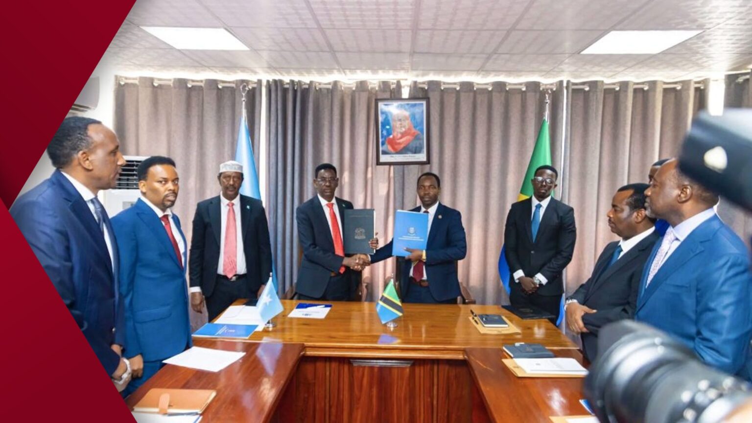 Young woman with long dark hair smiling while holding a coffee cup at an outdoor café bathed in morning sunlight