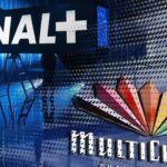 Close-up of polished blue and white marble showing flowing organic swirls and veins