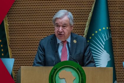 Abstract digital artwork featuring glowing electric-blue and magenta neon light trails swirling against a dark background